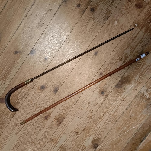 1148 - A sword stick and assorted other walking sticks (6)