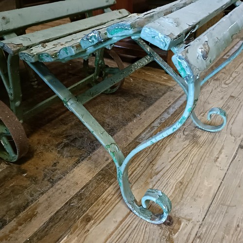 1279 - A pair of Country House green painted garden chairs, by Bacon & Curtis, Bournemouth, with metal ... 