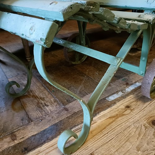 1279 - A pair of Country House green painted garden chairs, by Bacon & Curtis, Bournemouth, with metal ... 