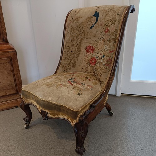 957 - ***Regretfully withdrawn*** An early Victorian rosewood chair, with a needlework back and seat