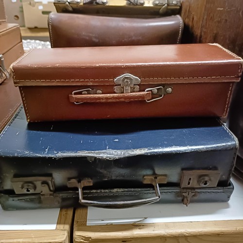 568 - A vintage leather suitcase, 58 cm wide, other cases, a metal bound barrel, 40 cm high, two buckets, ... 