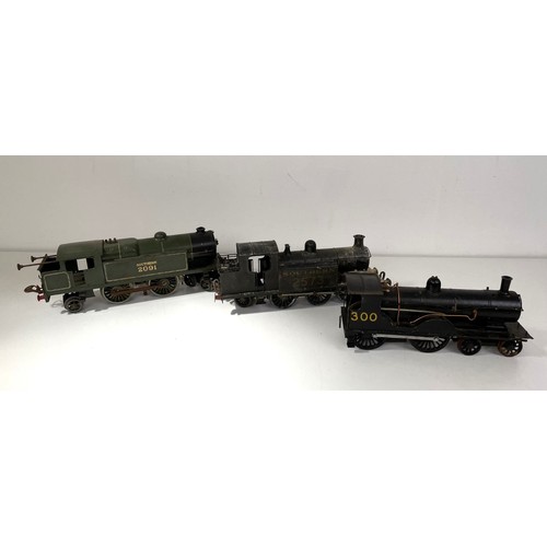 10 - An O gauge 4-4-2 locomotive, and two other locomotives (3)