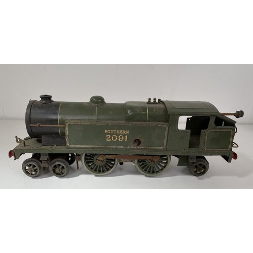 10 - An O gauge 4-4-2 locomotive, and two other locomotives (3)