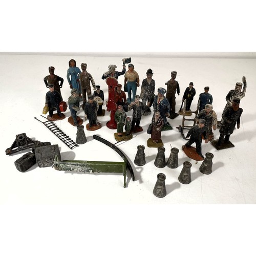 11 - Assorted painted lead railway porters, other figures, O gauge locomotive parts and related items (bo... 