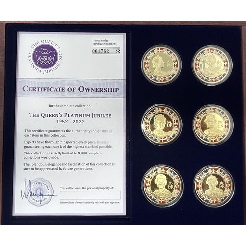 99 - A set of twenty four gold plated Most Expensive Coins of the World, cased, two other coin sets, case... 