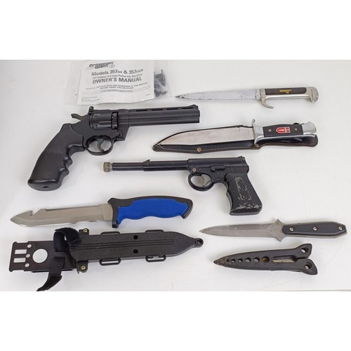 272 - ***Regretfully Withdrawn*** A trench shovel, assorted knives, assorted soft gun cases, and other ite... 