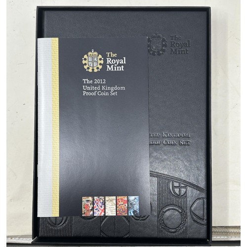 101 - A Royal Mint 2012 United Kingdom proof coin set, and three Royal Mint United Kingdom coin set collec... 