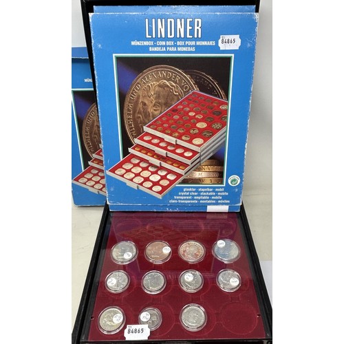 105 - A small group of American coins, in a Lindner four tray cabinet with two additional spare trays (3)