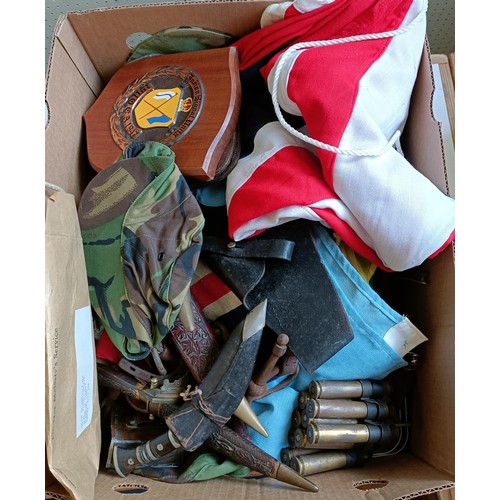 259 - Assorted flags, Malaysian daggers, shell cases, military clothing and other items (box)