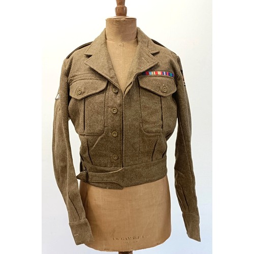 260 - The group of military clothing, photographs and other items, formerly belonging to Major Anthony Her... 