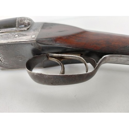 309 - A Victor Arpmerri 12 bore side by side shotgunNote: This can only be released to the buyer on produc... 