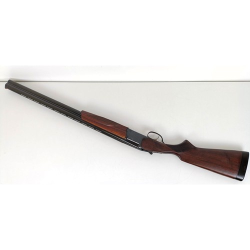 307 - A Russian 12 bore over and under double barrel shotgun, stamped Made In USSRNote: This can only be r... 