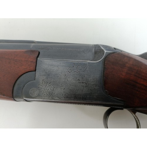 308 - A Baikal Model IJ-12, 28 3/4 length barrel, 12 bore over and under double barrel shotgun, stamped Ma... 