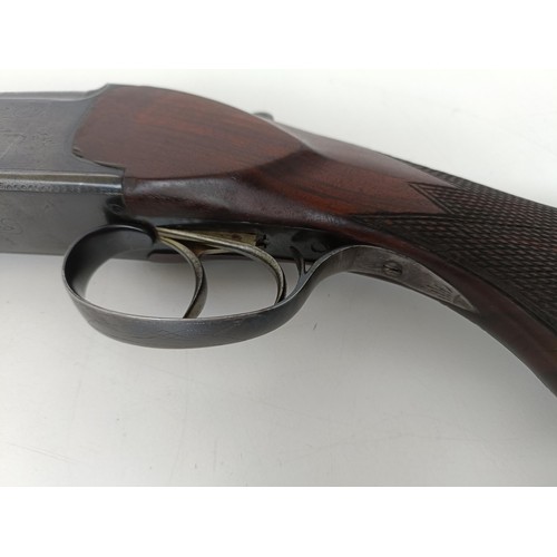 308 - A Baikal Model IJ-12, 28 3/4 length barrel, 12 bore over and under double barrel shotgun, stamped Ma... 