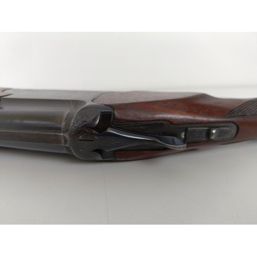 308 - A Baikal Model IJ-12, 28 3/4 length barrel, 12 bore over and under double barrel shotgun, stamped Ma... 