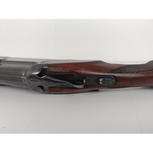 308 - A Baikal Model IJ-12, 28 3/4 length barrel, 12 bore over and under double barrel shotgun, stamped Ma... 