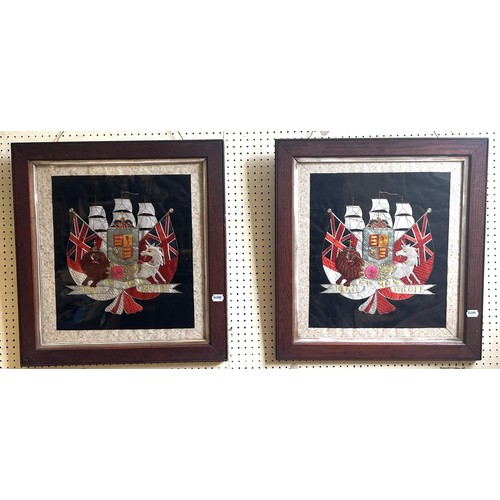 311 - A pair of embroidered military crests, each 42 x 32 cm