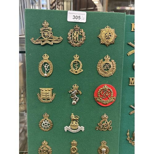 305 - A collection of assorted badges and shoulder titles, including the Tank Regiment and Machine Gun Cor... 