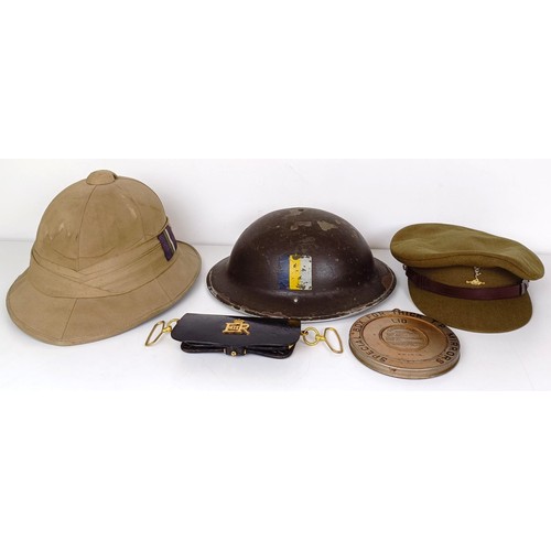 281 - The large group of uniforms, shirts, boots, hats and other items, formerly belonging to Major A G Ha... 