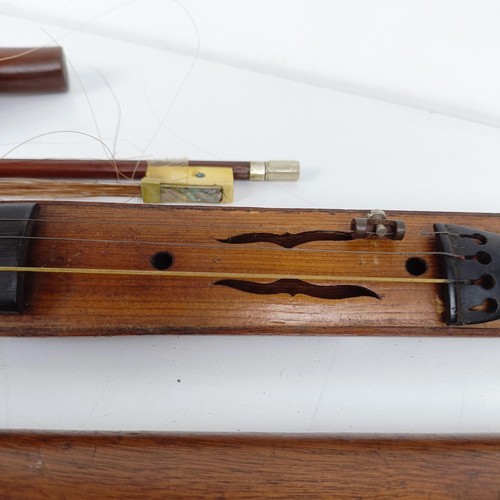 500 - A rare 19th century mahogany novelty walking stick violin, the bow (with an ivory frog) stored in th... 