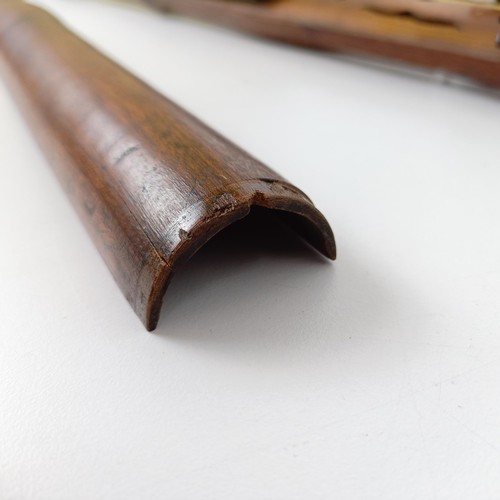 500 - A rare 19th century mahogany novelty walking stick violin, the bow (with an ivory frog) stored in th... 