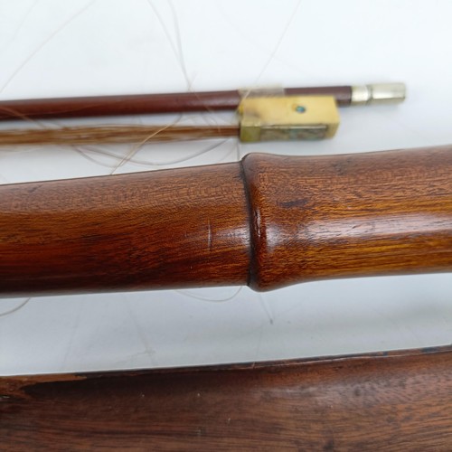 500 - A rare 19th century mahogany novelty walking stick violin, the bow (with an ivory frog) stored in th... 