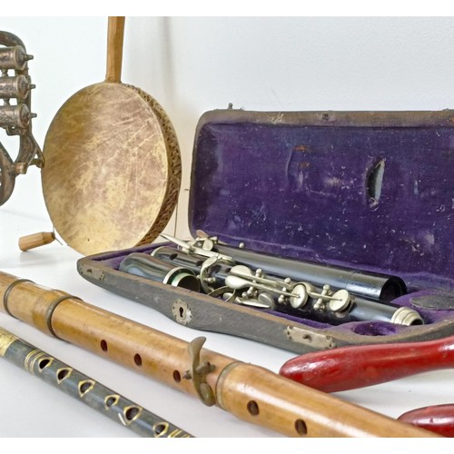 501 - A silver plated cornet, a pair of maracas, a tambourine, a part of a flute (one ivory piece has been... 