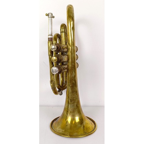 502 - A brass cornet, by Boosey & Co, London, No 88983, in a hardwood case