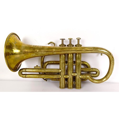 502 - A brass cornet, by Boosey & Co, London, No 88983, in a hardwood case