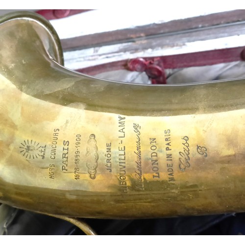 507 - A brass saxophone, by Hobs, Concours, Paris, in a hard wooden case