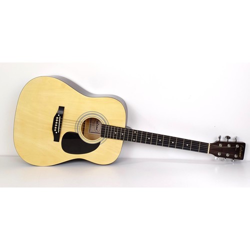 511 - A Falcon acoustic guitar, No FG100N, in a Kinsman hard case