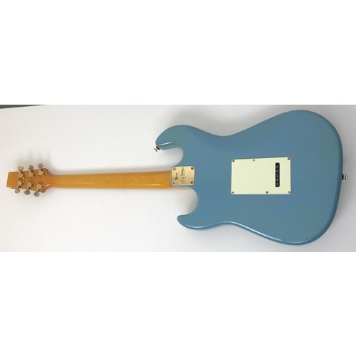 512 - A Burns electric guitar, Club Series, No 9911635, in a cloth case, with a portable amp