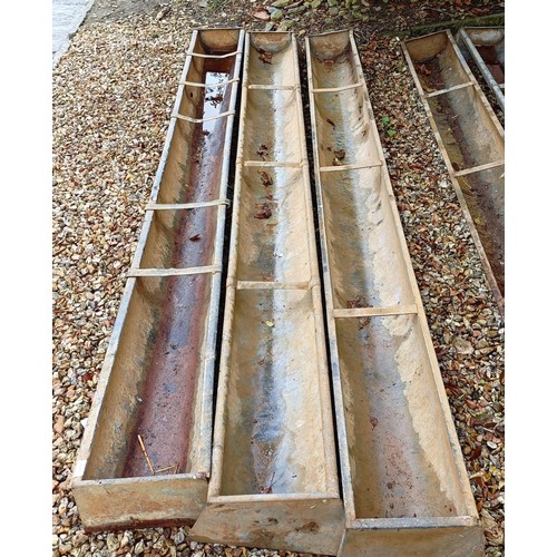 1055 - Three trough feeders, 218 cm long