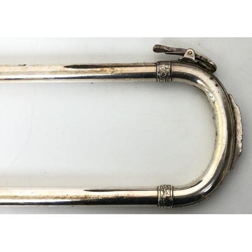 518 - A silver plated trombone, cased