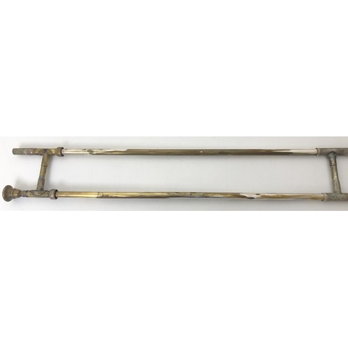 518 - A silver plated trombone, cased