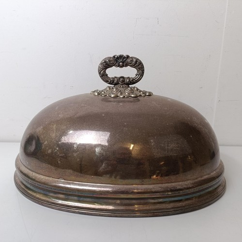 561 - A Victorian silver plated meat dish cover, crested, 40 cm wide