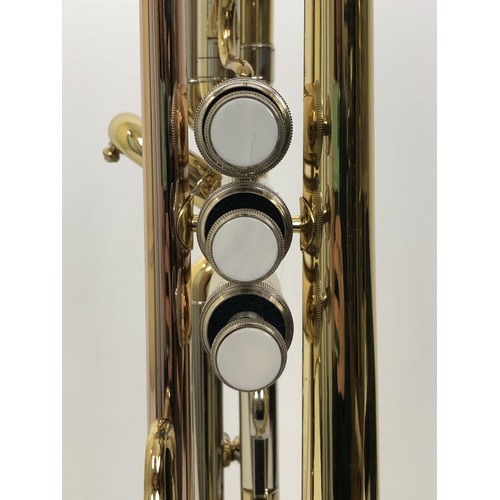 530 - A John Packer Ltd Blues 151 trumpet, cased, and a music stand (2)