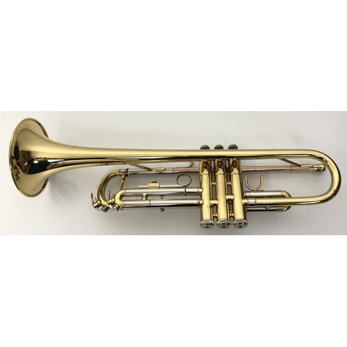 530 - A John Packer Ltd Blues 151 trumpet, cased, and a music stand (2)