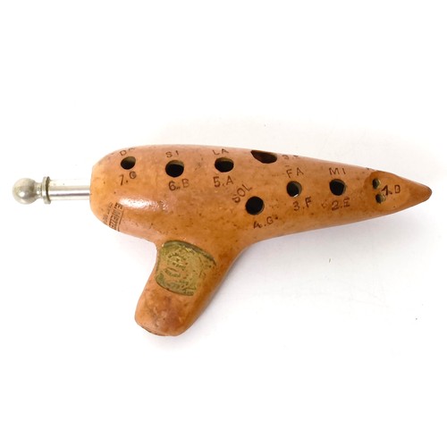 531 - A pottery ocarina, by E Mezzetti of Paris