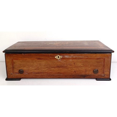 535 - An eight air music box, in a rosewood case, 50 cm wide