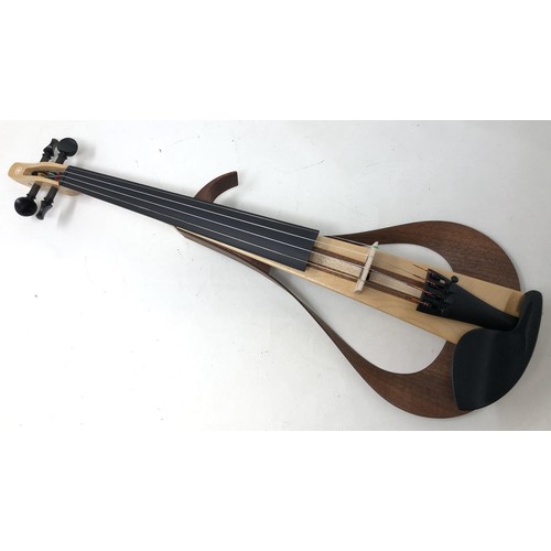 515 - A Yamaha electric violin, No YEV-104, with instructions, very lightly used, with a hard Stentor trav... 