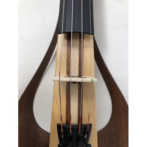 515 - A Yamaha electric violin, No YEV-104, with instructions, very lightly used, with a hard Stentor trav... 