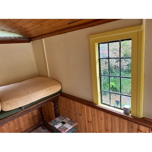 550 - A shepherd's style hut, removed from a Country House near Fordingbridge, with a draw bar, steps and ... 