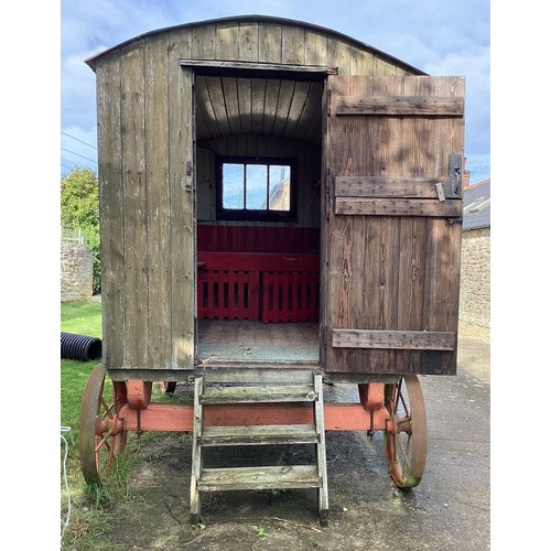 551 - A late 19th/early 20th century shepherd's hut, in largely original condition, with steps and a draw ... 