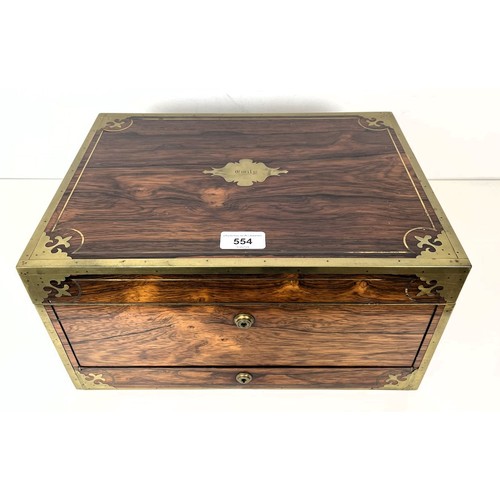 554 - A 19th century rosewood and brass bound jewellery box, the hinged top to reveal a mirror and two fit... 