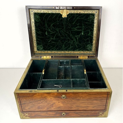 554 - A 19th century rosewood and brass bound jewellery box, the hinged top to reveal a mirror and two fit... 