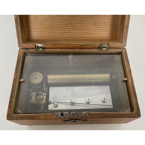 562 - A music box, in a pine case, 15 cm wide, and a writing box, 36 cm wide (2)