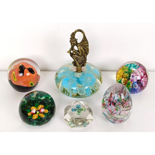 655 - A Caithness glass paperweight, and five other glass paperweights (6)