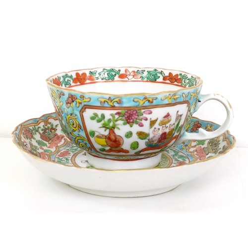 664 - A Chinese famille rose cup and saucer