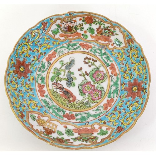 664 - A Chinese famille rose cup and saucer